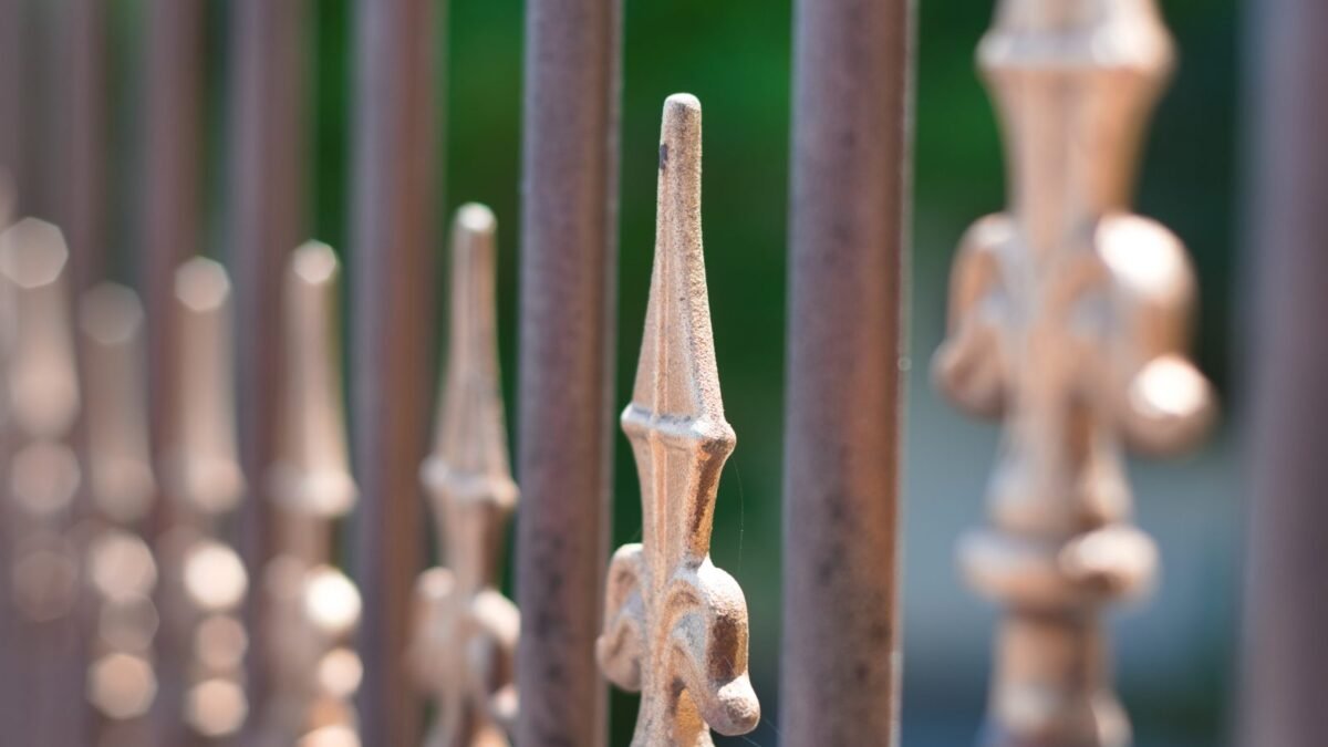 Wrought iron fence with decorative spear finials, from our fence installation cost guide